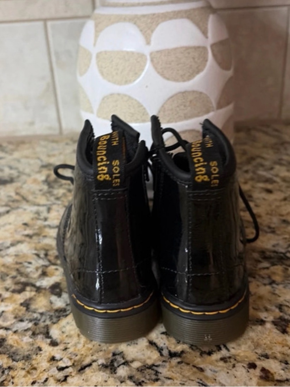 Dr. Martens Kids Black Patent Leather Ankle Boots with Yellow Stitching
